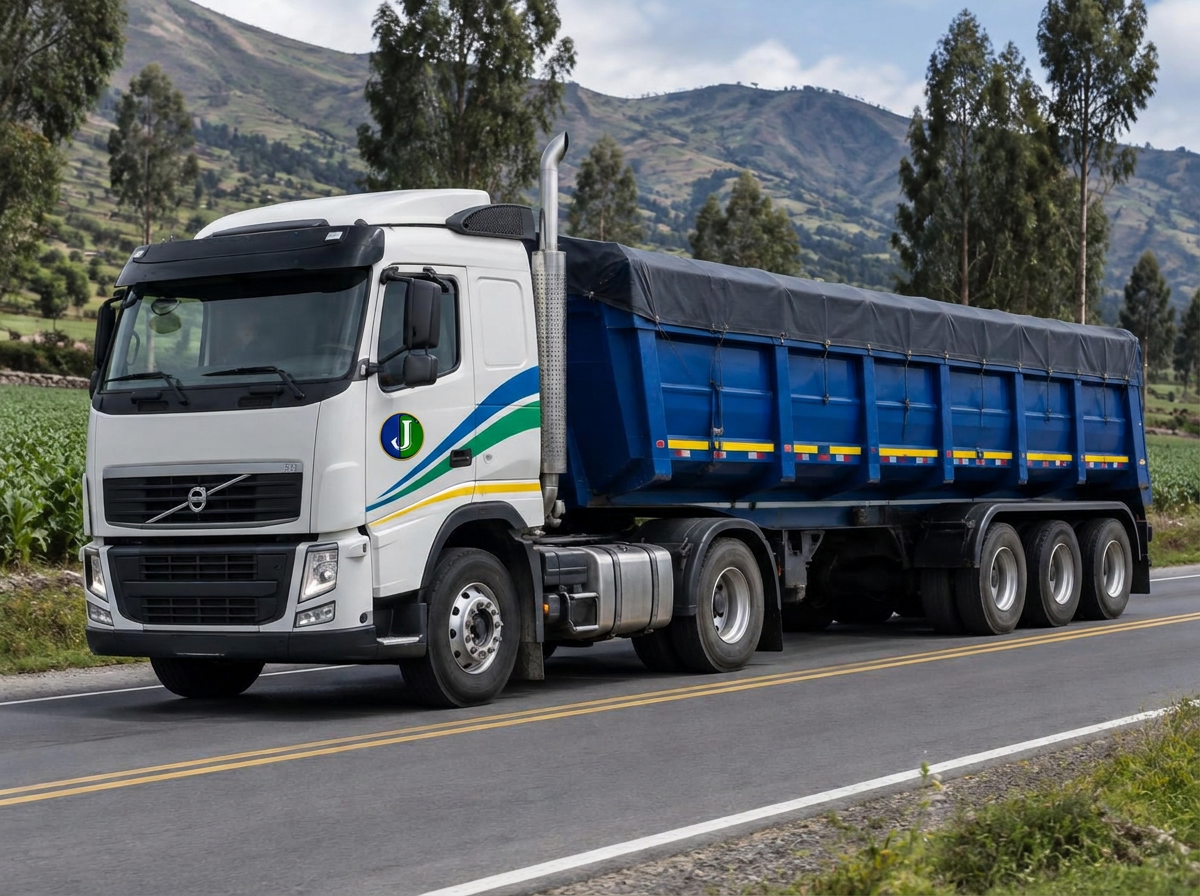 Tractocamión Volvo con tolva en un valle interandino